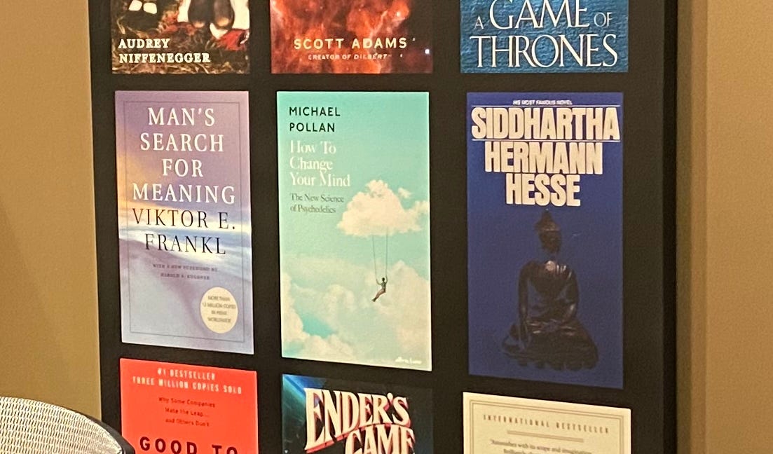 Author’s wall poster featuring some of his favourite books, because bookshelves aren’t a thing any more